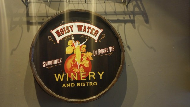 Noisy Water ad at a local wine bar